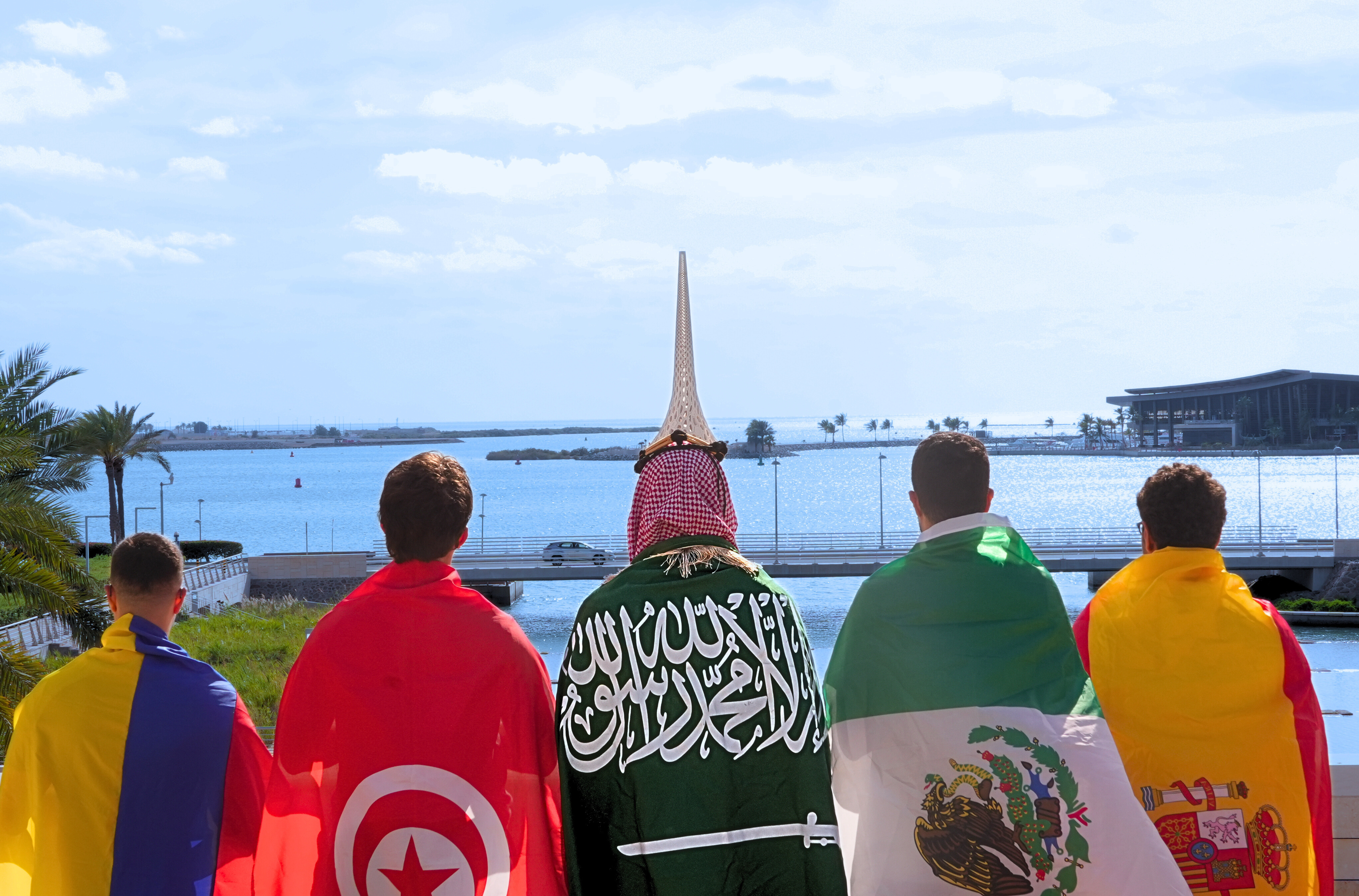 Salem Al-Saqaf photography — group with flags by the waterfront