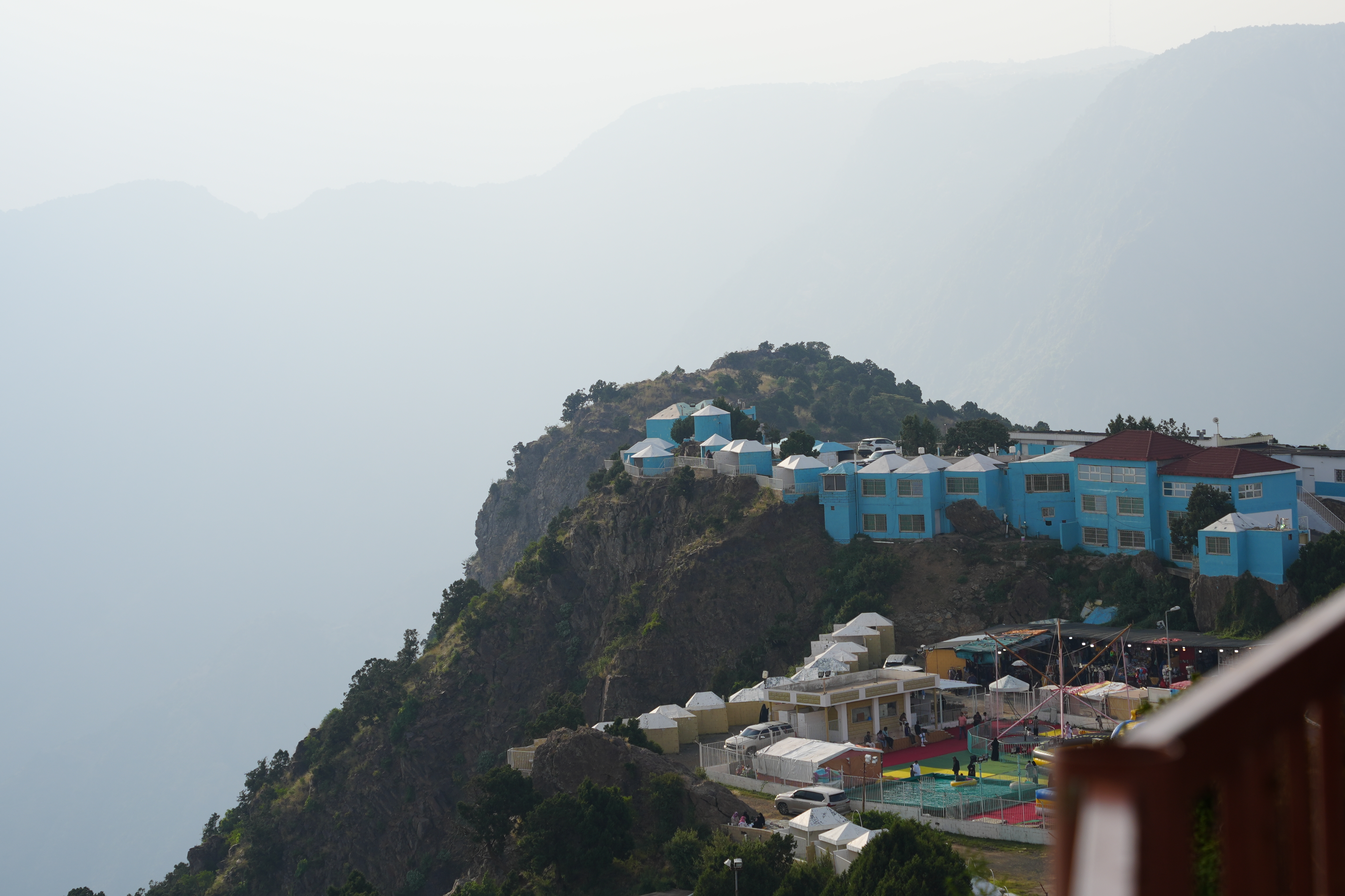 Lake reflecting snowy mountains